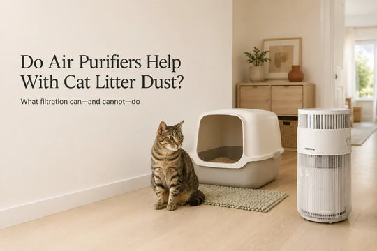 White W-Cat air purifier placed on open floor space near a cat litter area.